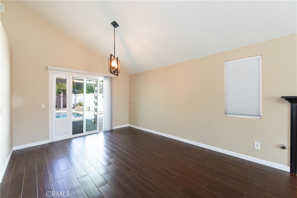 39203 Laurel Leaf Drive Murrieta, CA 92563 - Photo 9 of 59 a big room with wooden floor and windows