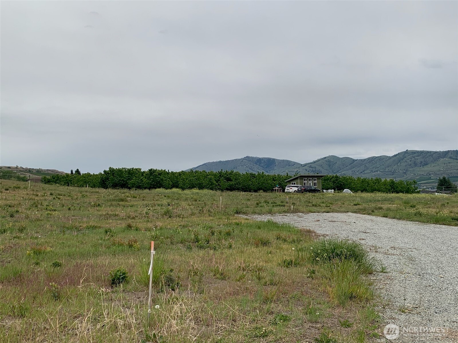 127 Hurley Lane Manson, WA 98831 - Photo 29 of 29 a view of lake with mountain view