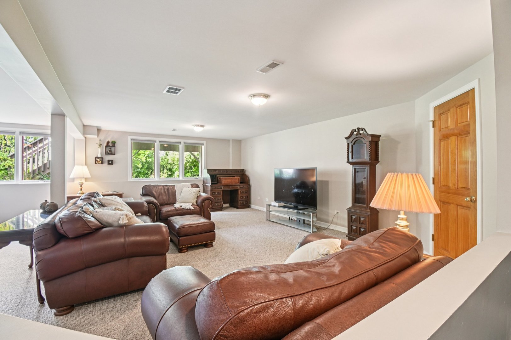 4N466 Mark Twain Street St. Charles, IL 60175 - Photo 23 of 36 a living room with furniture window and a flat screen tv