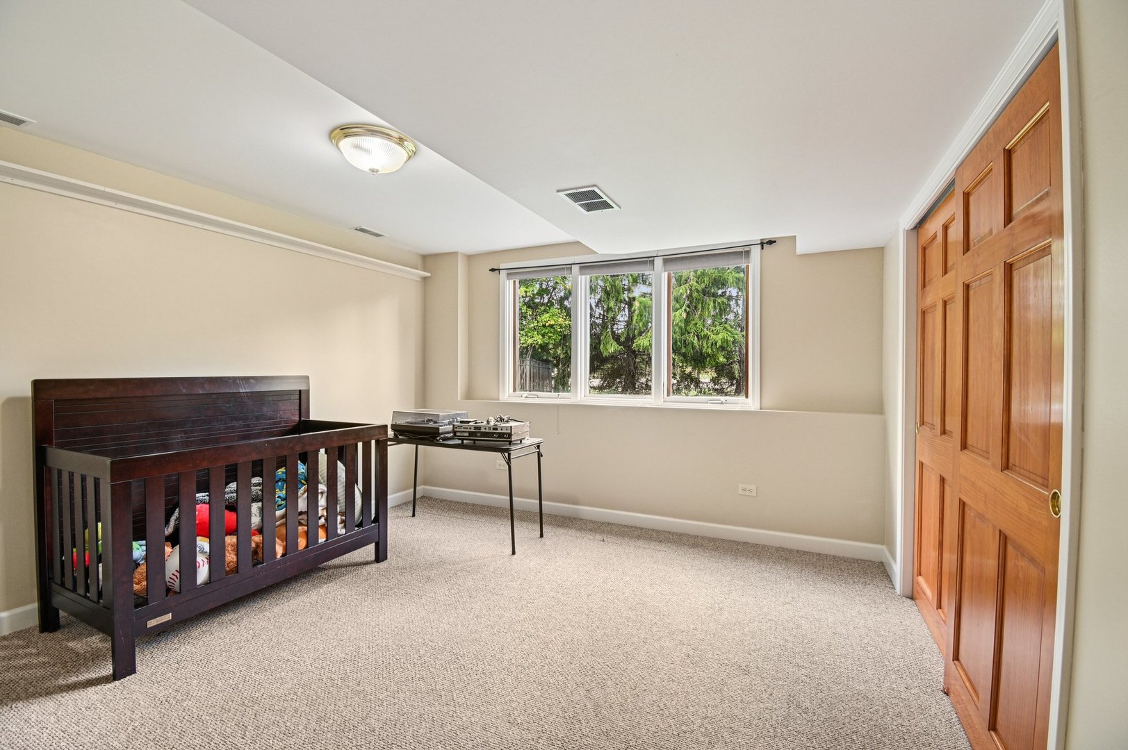 4N466 Mark Twain Street St. Charles, IL 60175 - Photo 31 of 36 a living room with furniture and a window