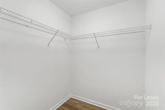 a view of a room with racks on the wall