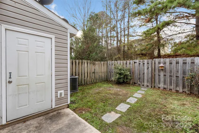 a view of backyard with green space