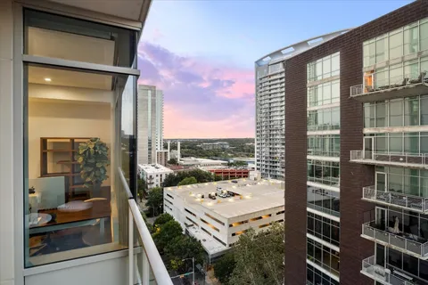 a view of a room with furniture and front door