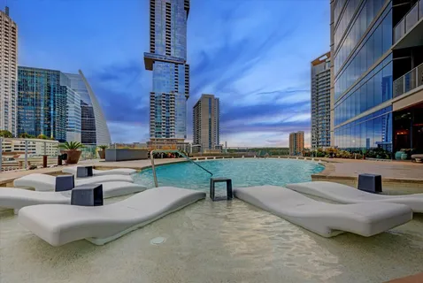 a view of a water with a building in the background