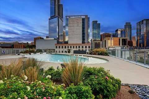 a view of a chairs and table in the patio