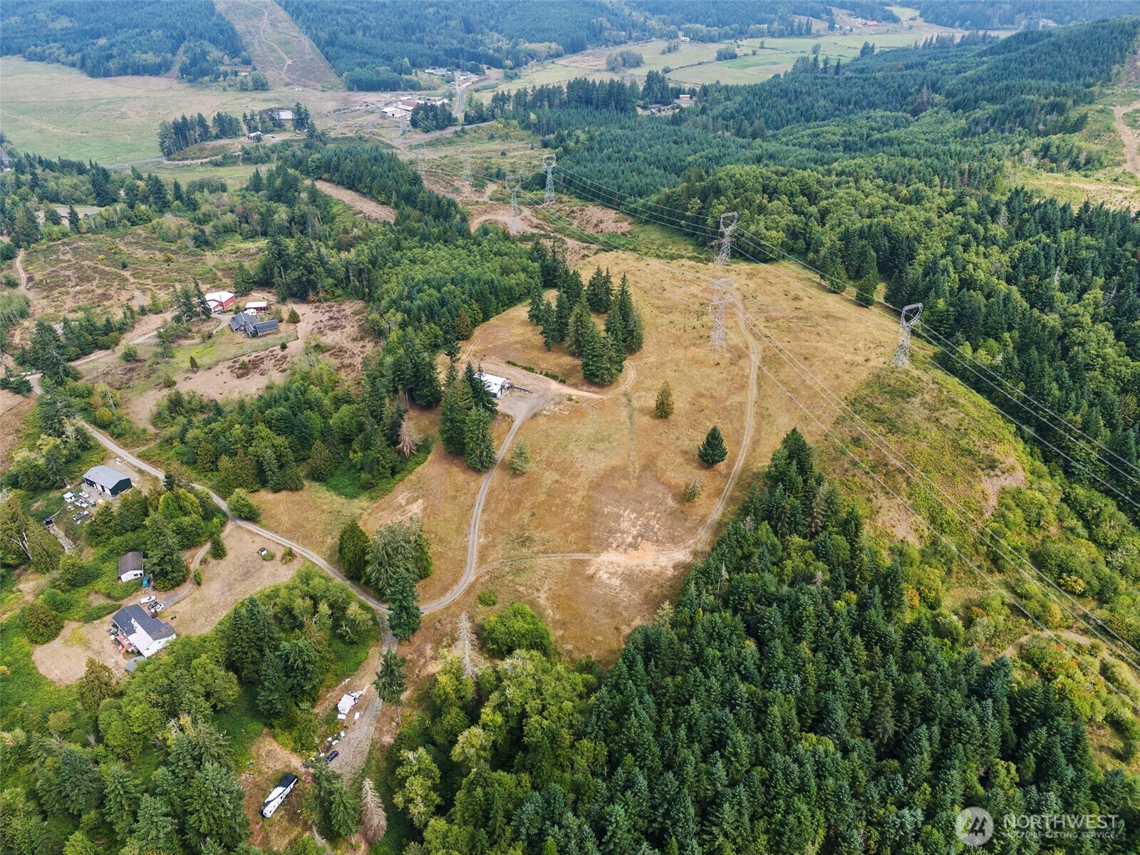 207 Ramsaur Road, Unit E Centralia, WA 98531 - Photo 3 of 21 an aerial view of a house with a yard and lake