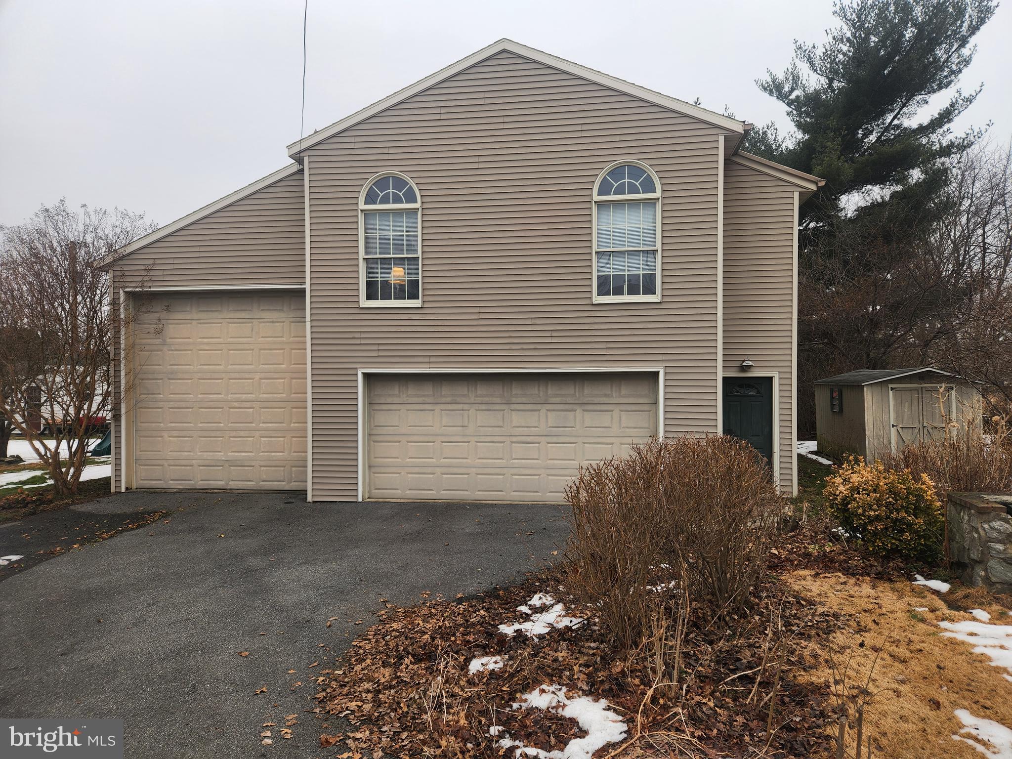 2707 Kimberly Road Lancaster, PA 17603 - Photo 14 of 17 a front view of a house with garden