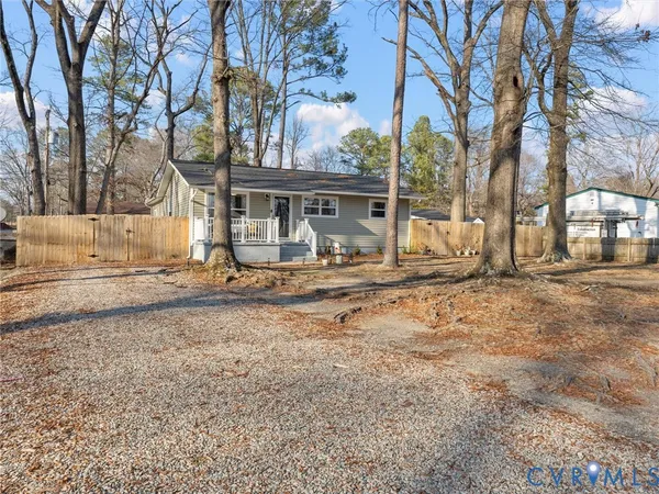 a house with trees in front of it