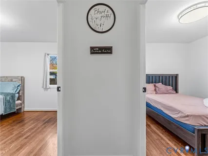 a bedroom with a bed and a table in it