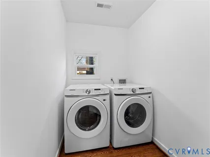 a utility room with dryer and washer