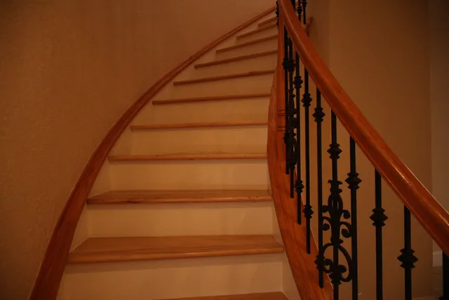 a view of hallway with wooden floor