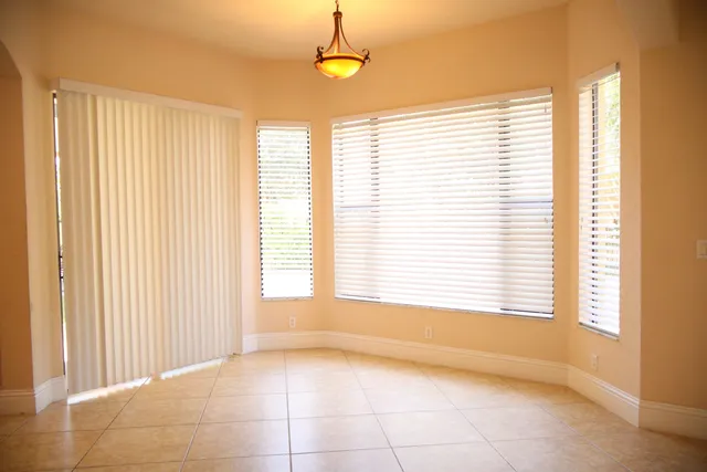 a view of a hallway with a chandelier