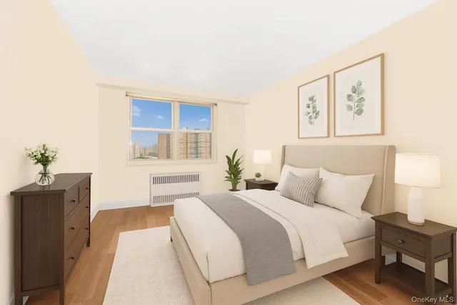 a bedroom with a bed and a cabinets