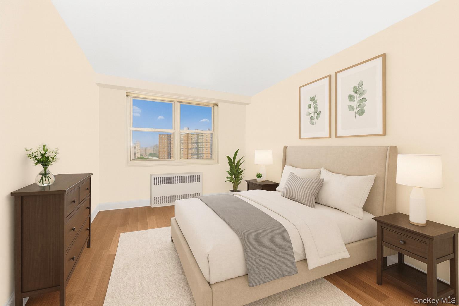 880 Boynton Avenue, Unit 13L Bronx, NY 10473 - Photo 7 of 19 a bedroom with a bed and a cabinets