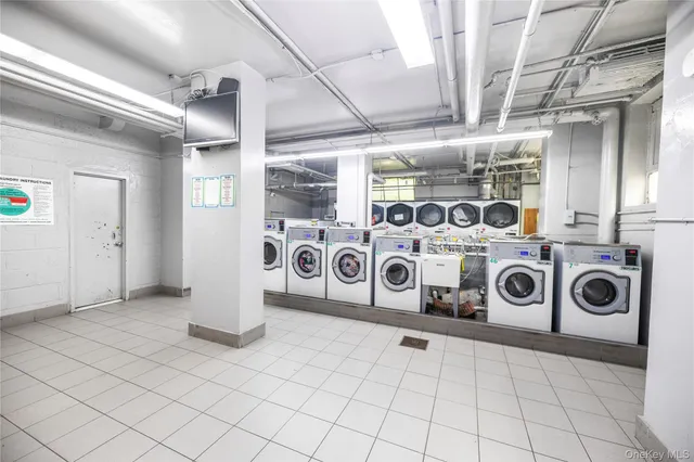 a utility room with stainless steel appliances