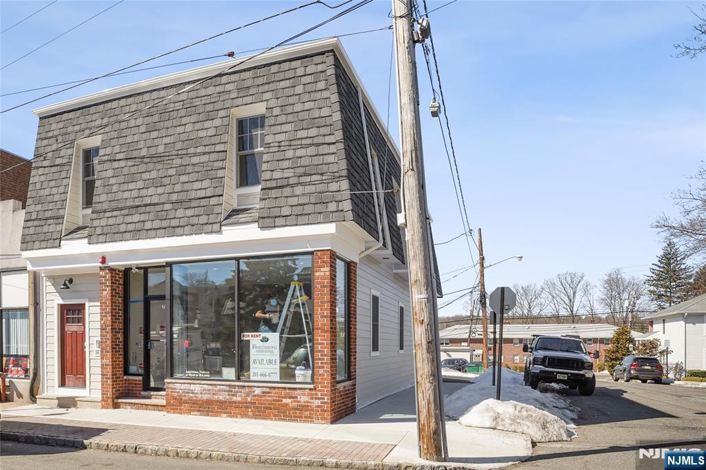 a outdoor view of a building with car parked