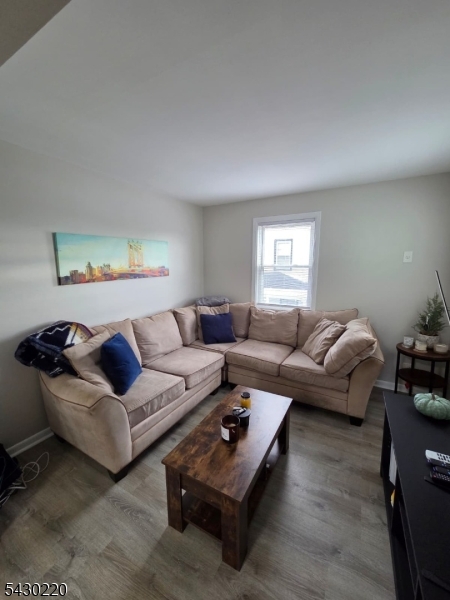 166 Carmita Avenue Rutherford, NJ 07070 - Photo 6 of 27 a living room with furniture and a couch
