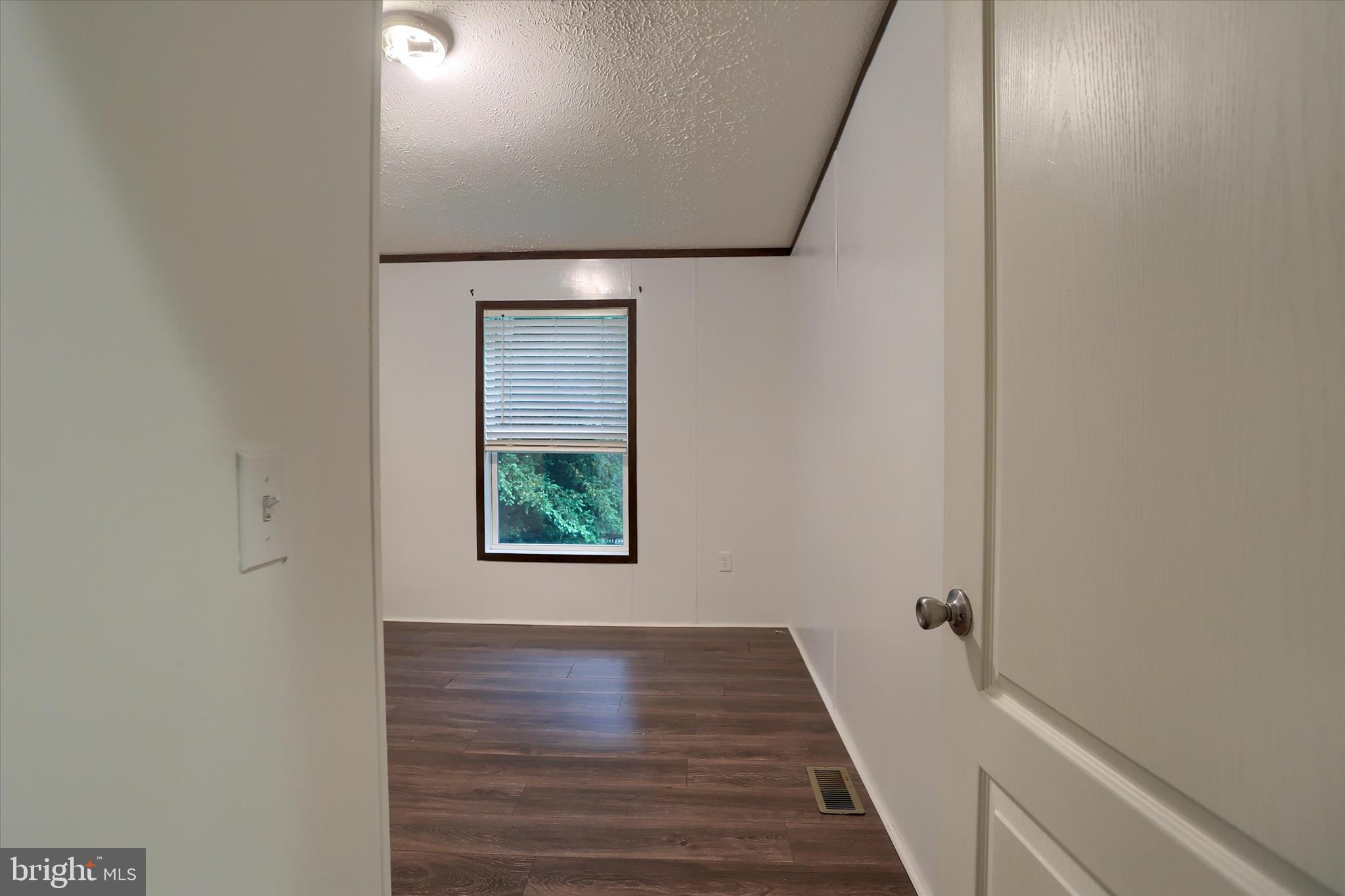 1148 Moulstown Road North Hanover, PA 17331 - Photo 20 of 29 a view of a hallway with wooden floor and a window