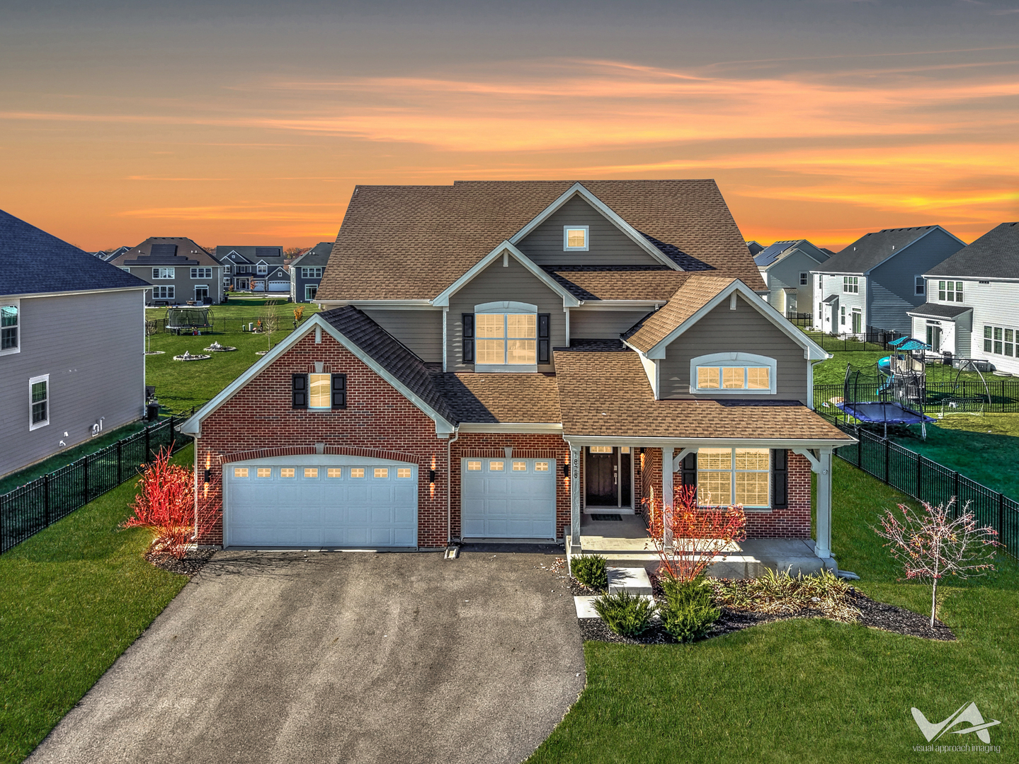 1828 Coralito Lane Elgin, IL 60124 - Photo 1 of 65 a front view of a house with a yard