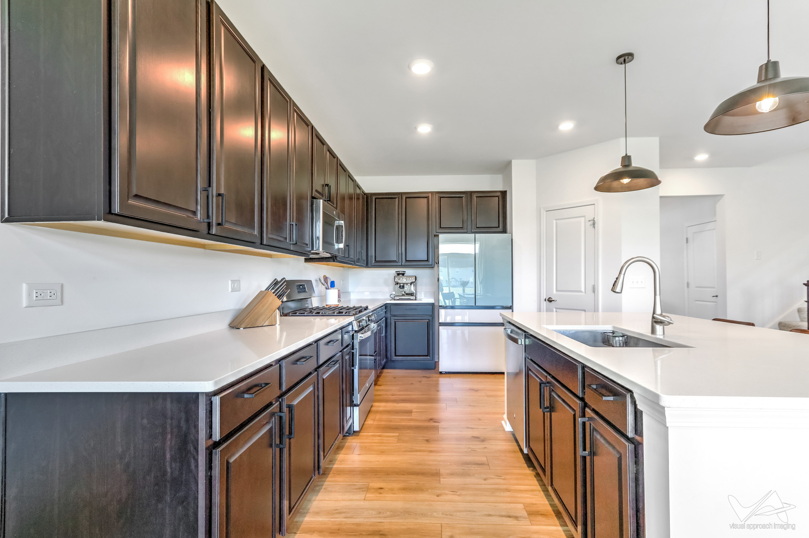 1828 Coralito Lane Elgin, IL 60124 - Photo 14 of 65 a kitchen with stainless steel appliances granite countertop counter space cabinets a sink and a counter top space