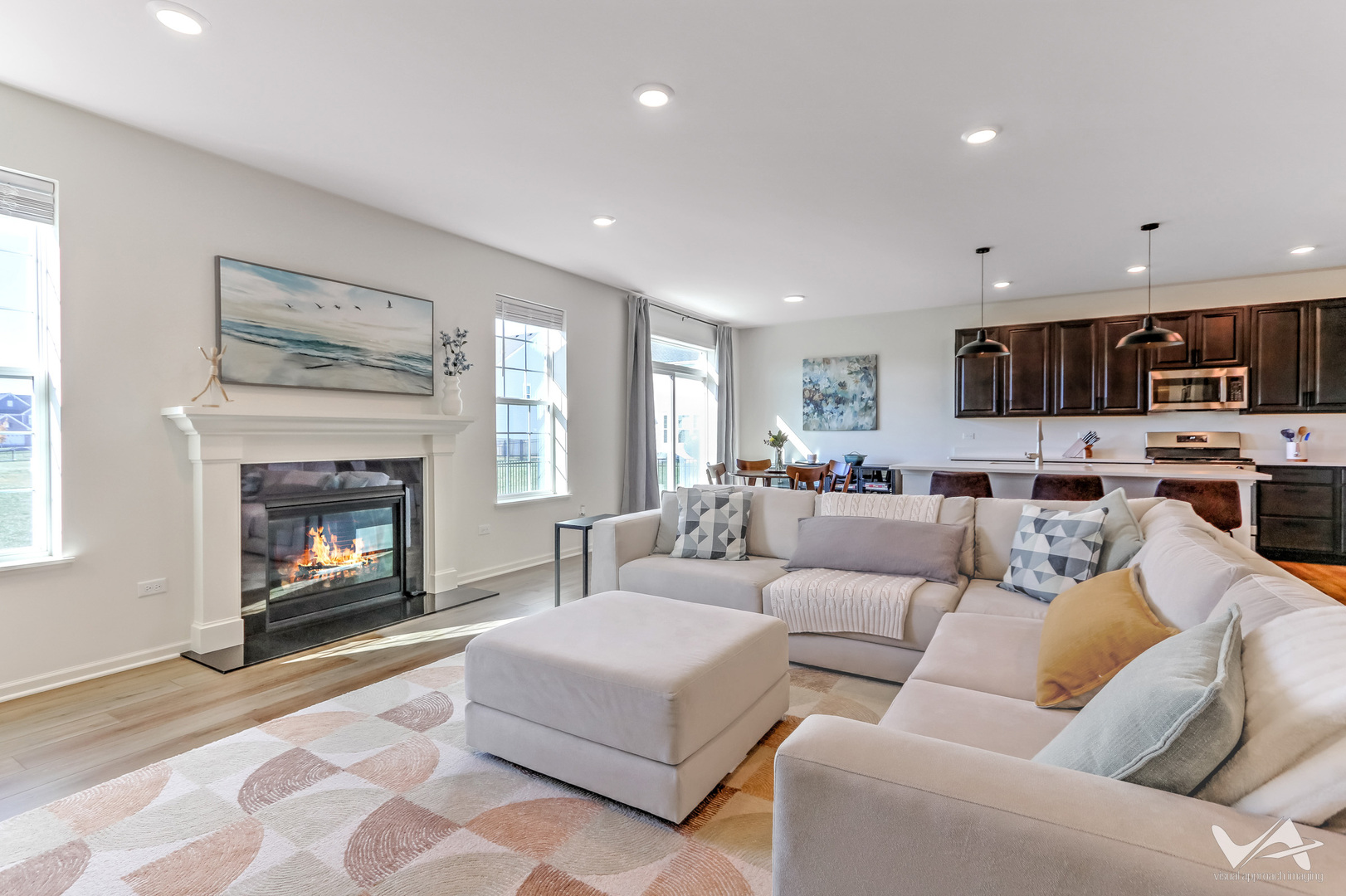 1828 Coralito Lane Elgin, IL 60124 - Photo 20 of 65 a living room with furniture a fireplace and a flat screen tv