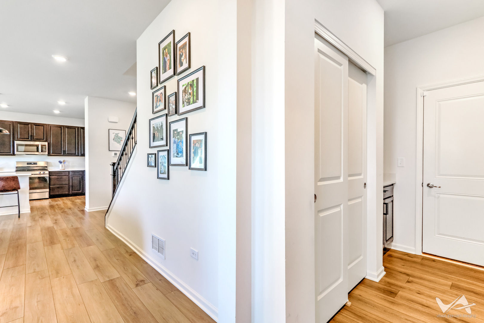 1828 Coralito Lane Elgin, IL 60124 - Photo 22 of 65 a view of a hallway with wooden floor and staircase