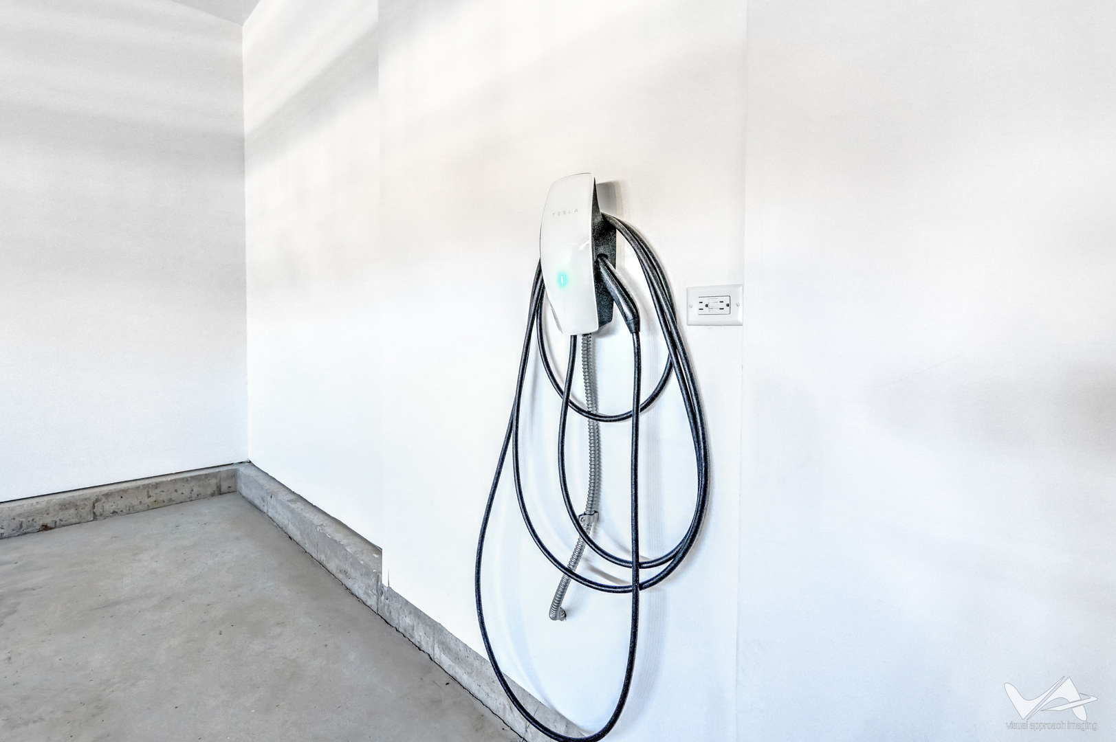 1828 Coralito Lane Elgin, IL 60124 - Photo 45 of 65 a picture of a white wall with a potted plant