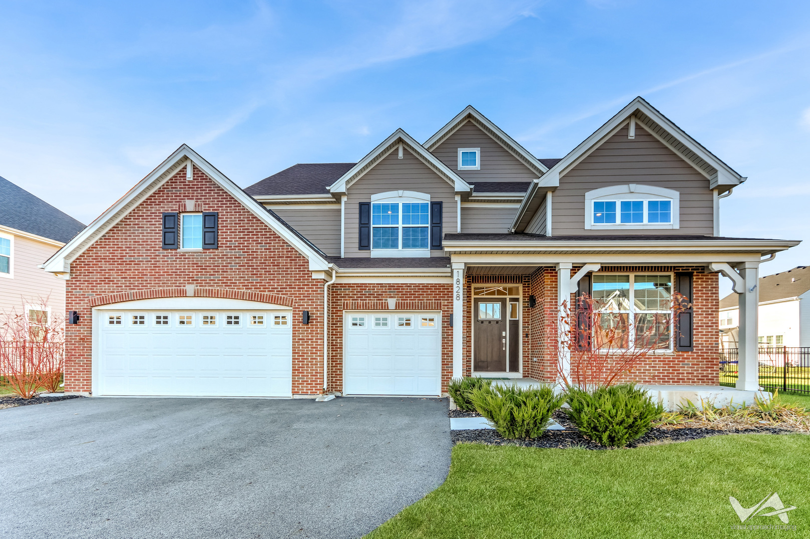 1828 Coralito Lane Elgin, IL 60124 - Photo 49 of 65 a front view of a house with garden