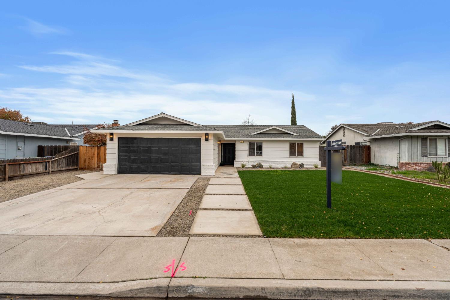 1265 Georgetown Avenue Turlock, CA 95382 - Photo 1 of 1 a front view of a house with a yard