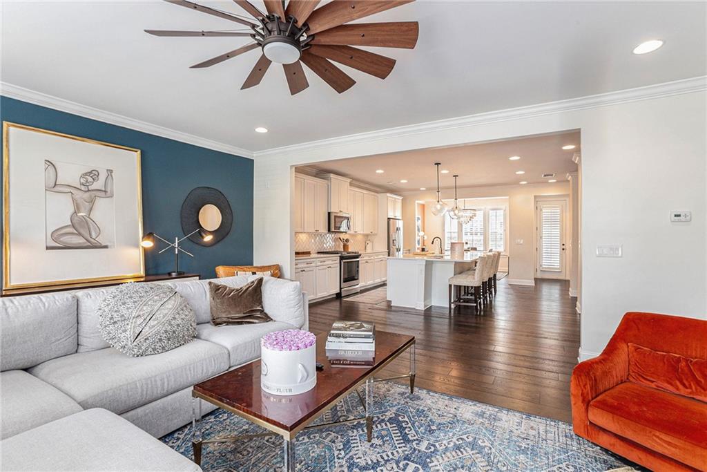 1438 Druid Manor Boulevard Atlanta, GA 30329 - Photo 11 of 31 a living room with furniture or wooden floor and a chandelier