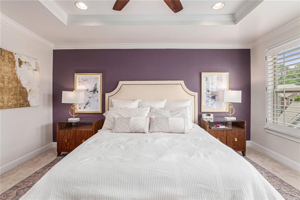 1438 Druid Manor Boulevard Atlanta, GA 30329 - Photo 16 of 31 a bedroom with a large bed and a window