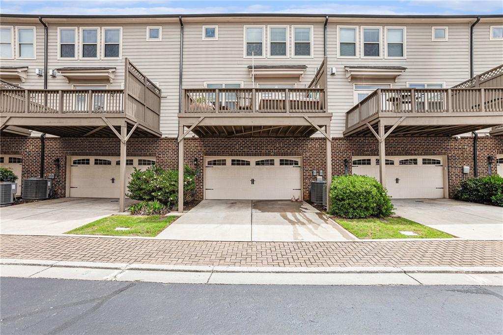 1438 Druid Manor Boulevard Atlanta, GA 30329 - Photo 25 of 31 a front view of a house with a yard