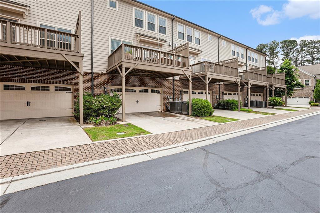 1438 Druid Manor Boulevard Atlanta, GA 30329 - Photo 27 of 31 front view of a building with a yard