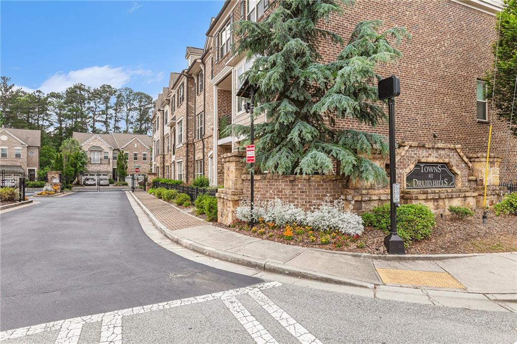 1438 Druid Manor Boulevard Atlanta, GA 30329 - Photo 30 of 31 a view of a street with a building in the background