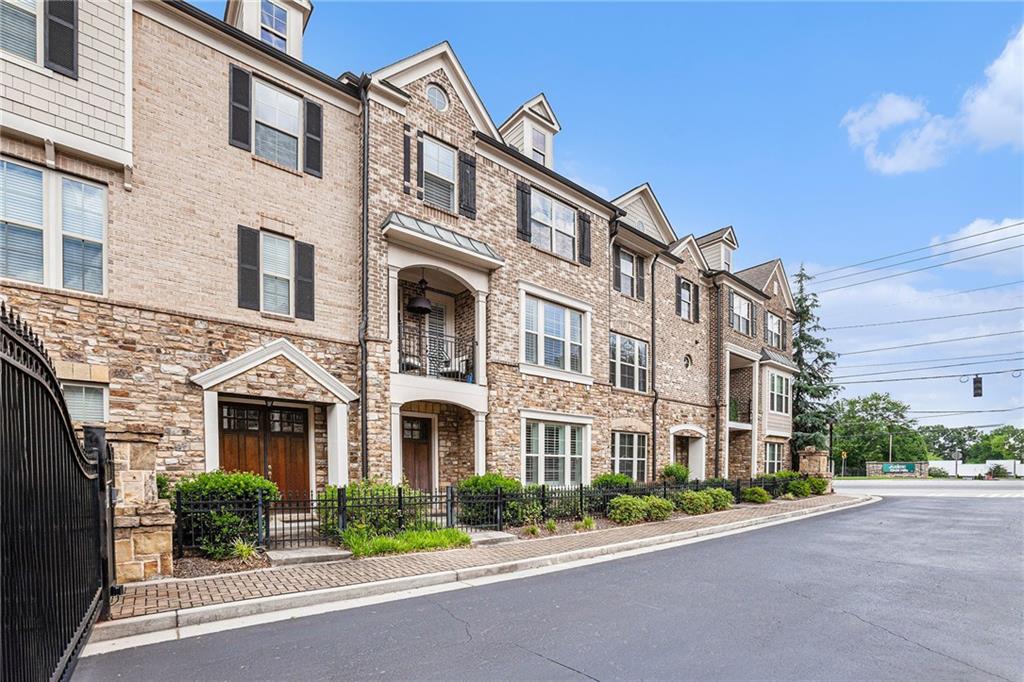 1438 Druid Manor Boulevard Atlanta, GA 30329 - Photo 31 of 31 a front view of a building with garden