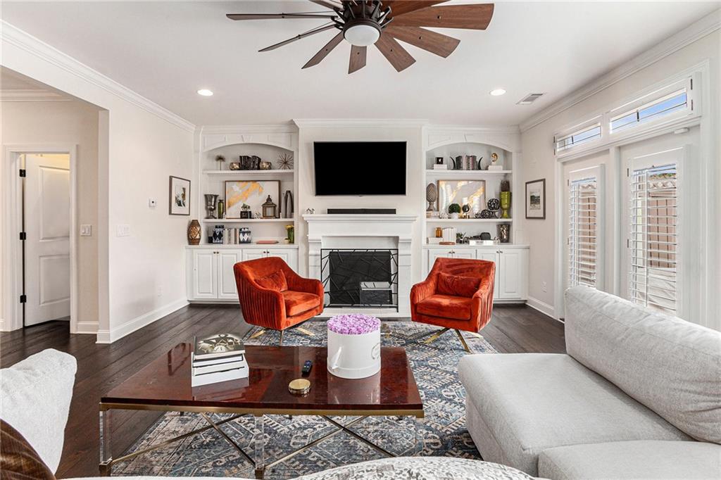 1438 Druid Manor Boulevard Atlanta, GA 30329 - Photo 8 of 31 a living room with furniture fireplace and a flat screen tv