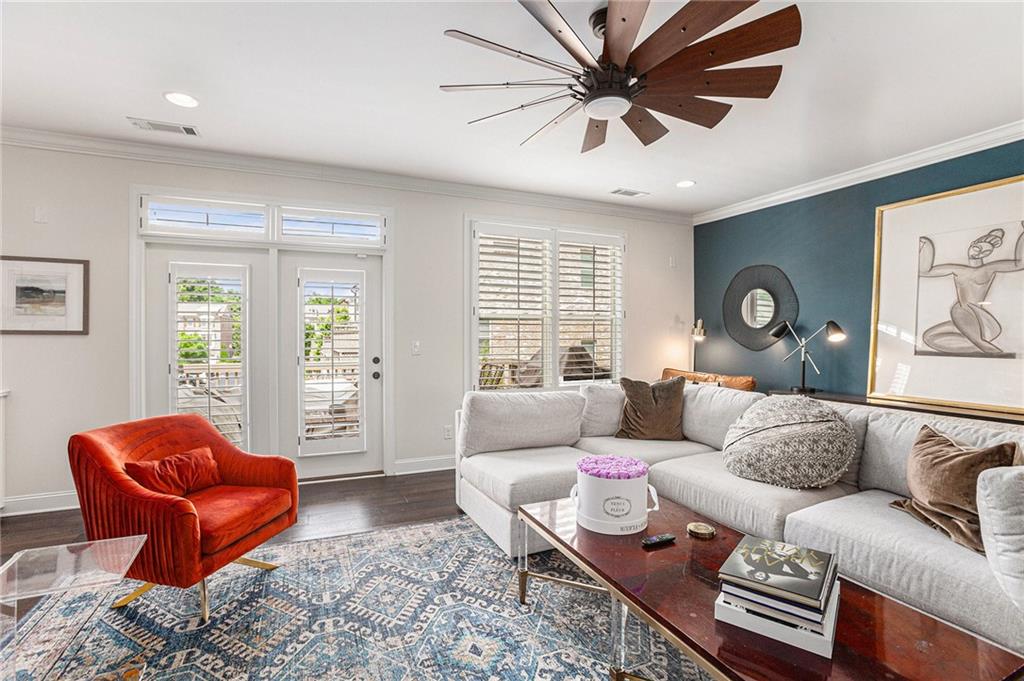 1438 Druid Manor Boulevard Atlanta, GA 30329 - Photo 9 of 31 a living room with furniture and a large window