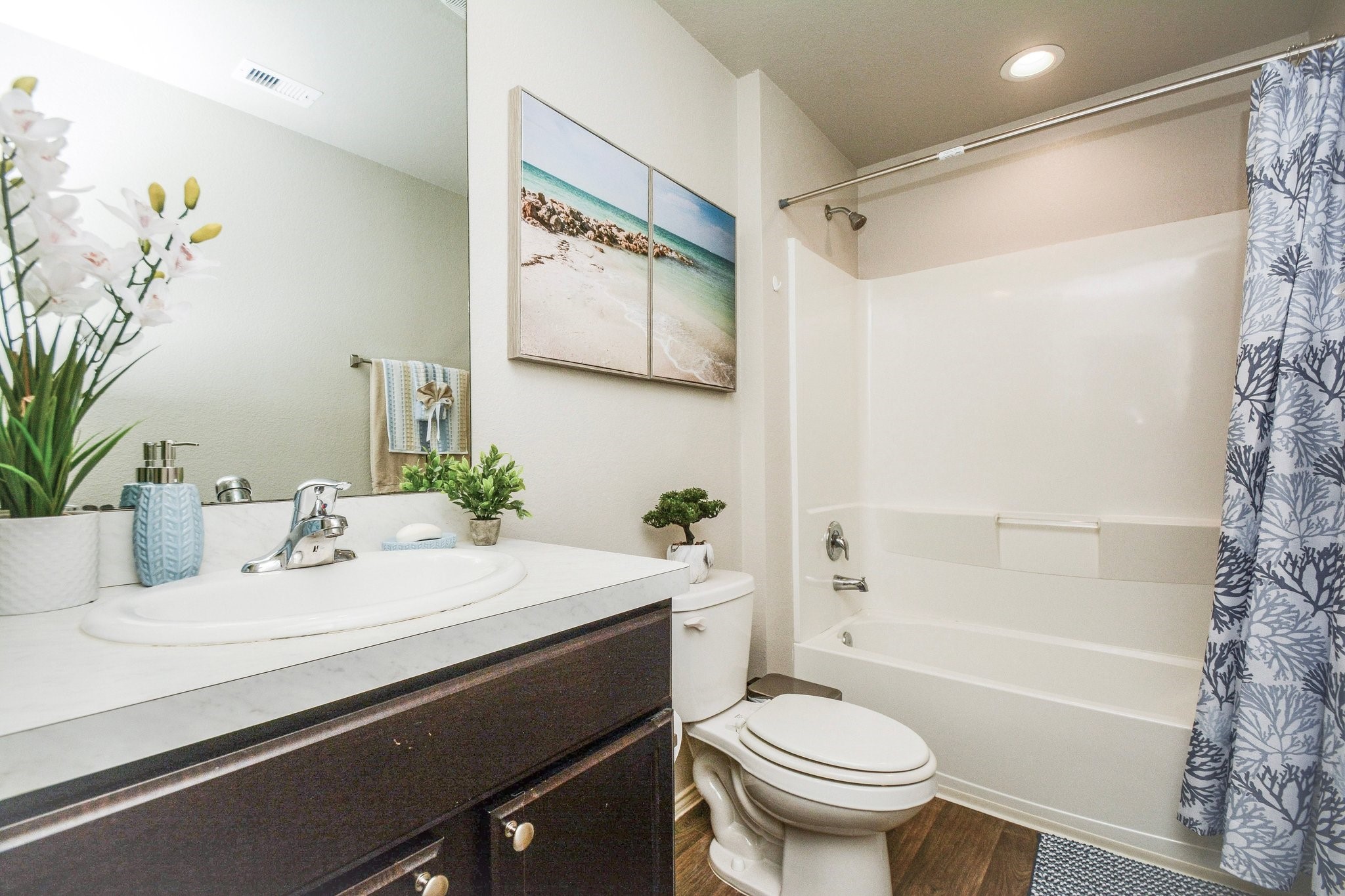 23510 Harrow Fld Lane Spring, TX 77373 - Photo 8 of 18 a bathroom with a sink a toilet and shower