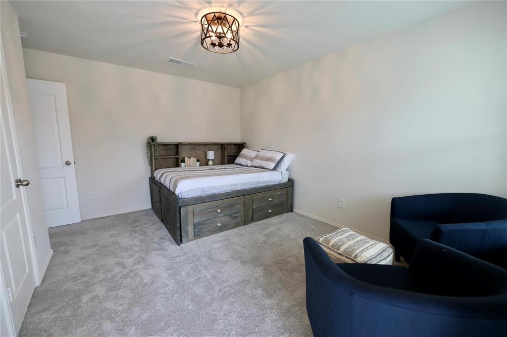 8404 Timberbrook Lane Dallas, TX 75249 - Photo 12 of 32 a room with a couch and a couch