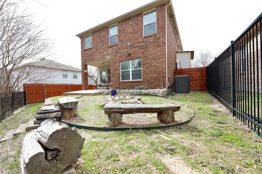 8404 Timberbrook Lane Dallas, TX 75249 - Photo 29 of 32 a front view of a house with swimming pool