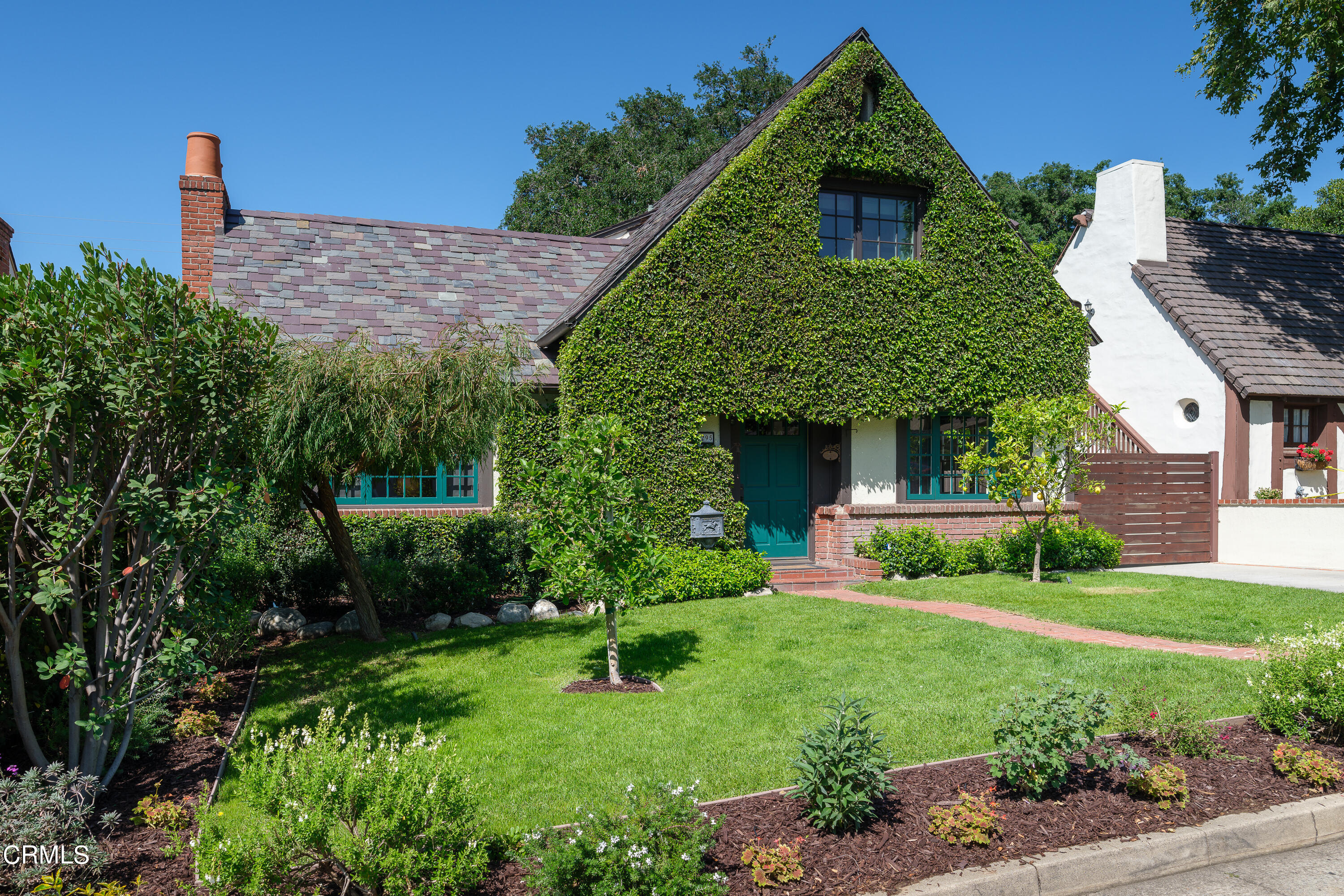 2295 Norwic Place Altadena, CA 91001 - Photo 1 of 60 a front view of a house with a yard and garage