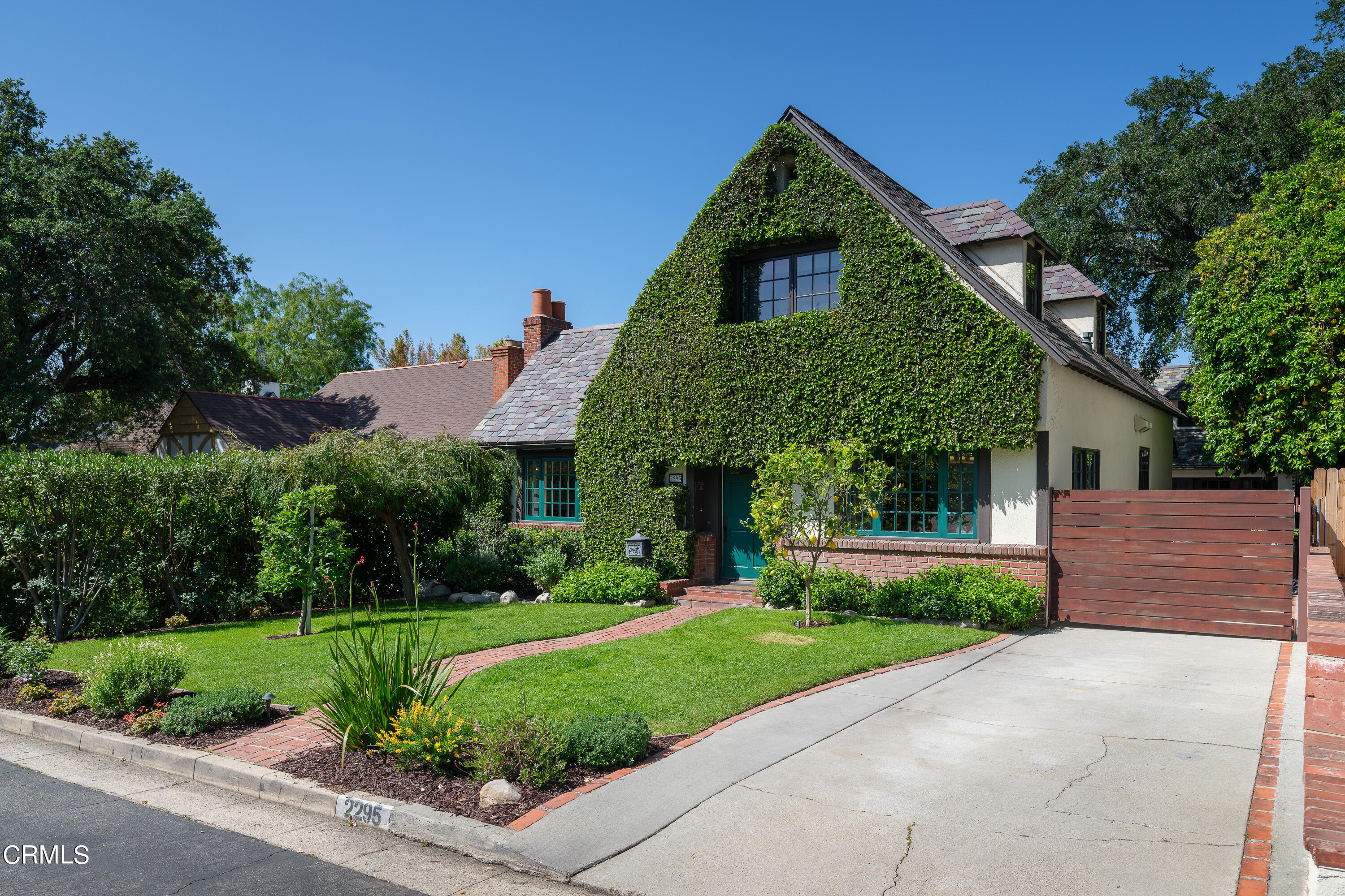 2295 Norwic Place Altadena, CA 91001 - Photo 3 of 60 a front view of a house with a yard