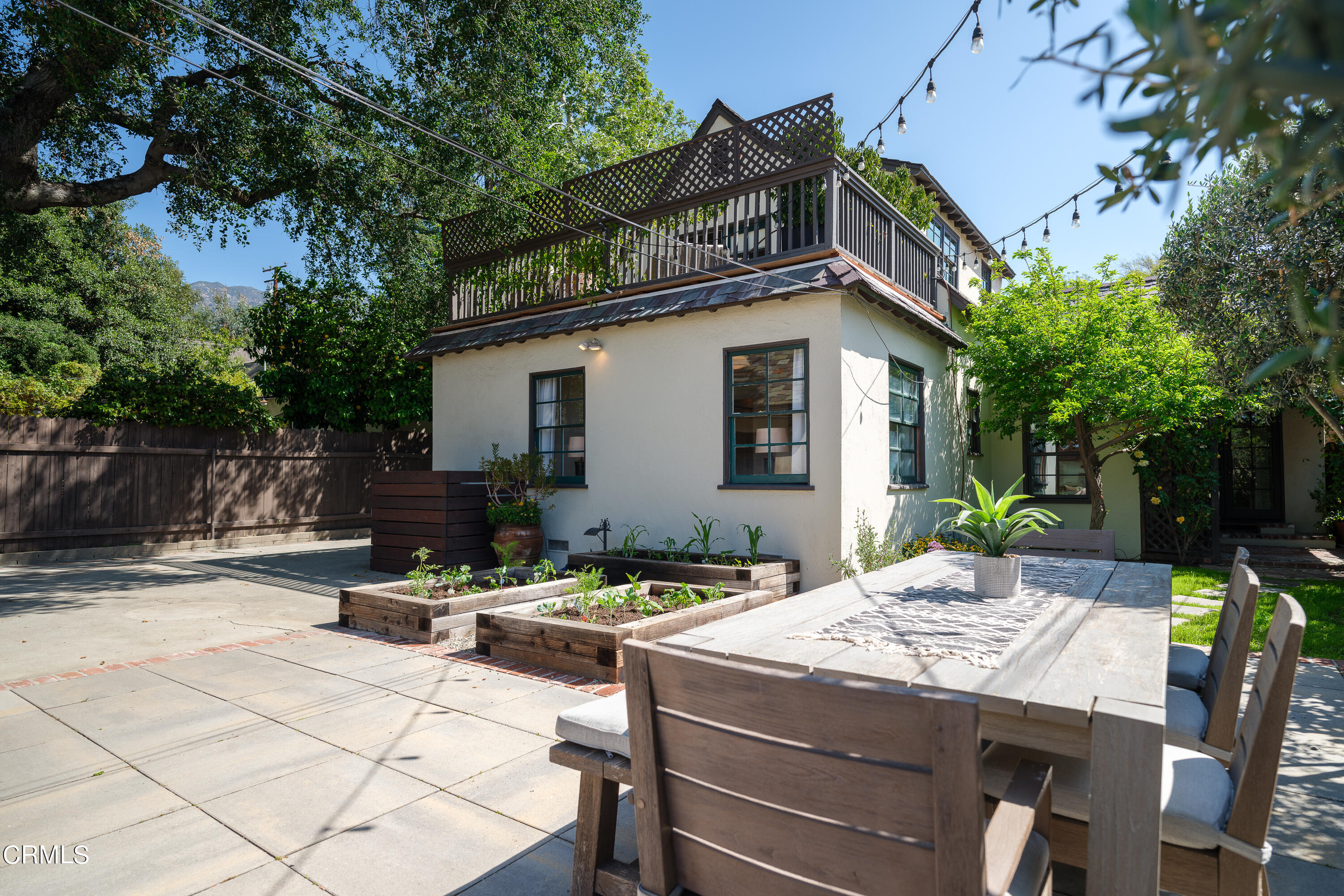 2295 Norwic Place Altadena, CA 91001 - Photo 43 of 60 a view of a patio with table and chairs and potted plants