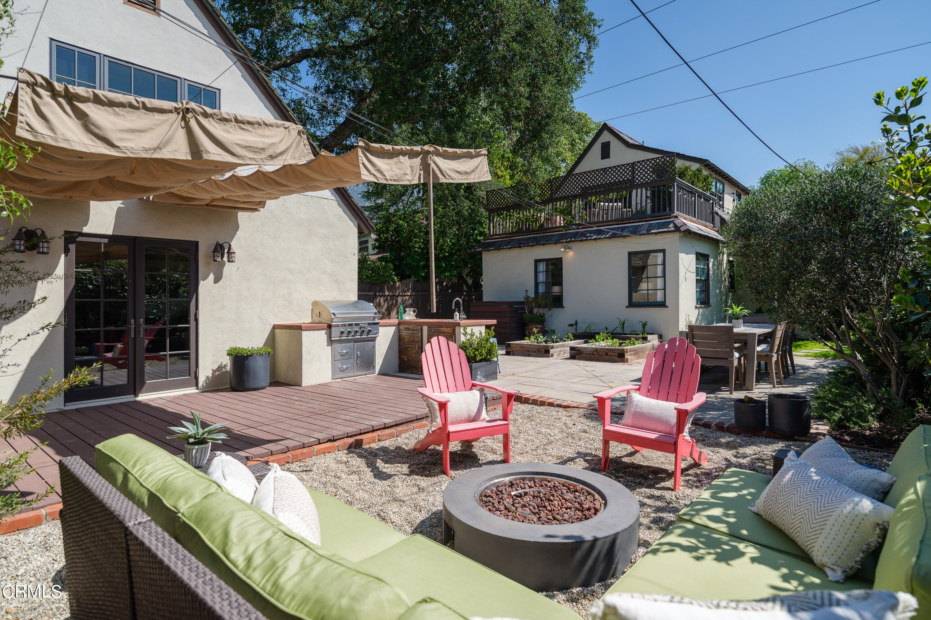 2295 Norwic Place Altadena, CA 91001 - Photo 53 of 60 a view of a patio with couches table and chairs and potted plants