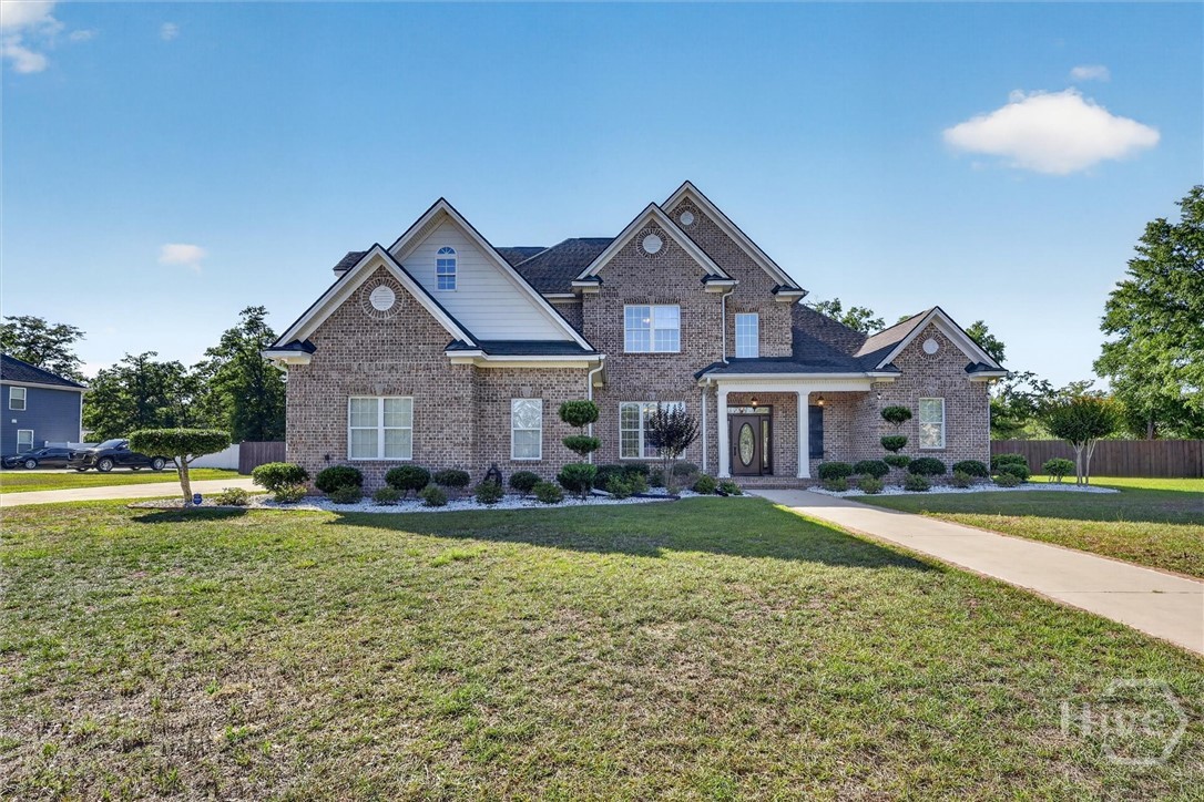 197 Cubbedge Drive Rincon, GA 31326 - Photo 41 of 43 Crazy curb appeal, located at roundabout and across from under planned community center