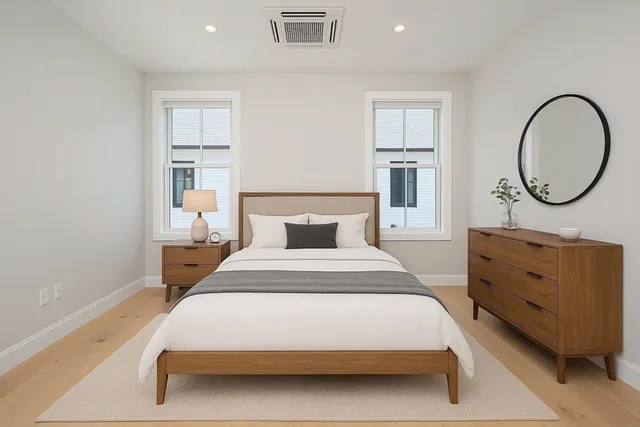 a view of a room that has a large window