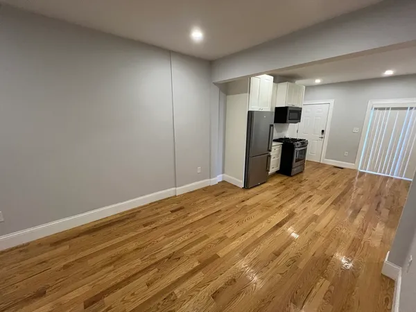 a view of a livingroom with a staircase