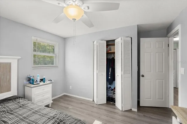 a view of room with furniture and wooden floor
