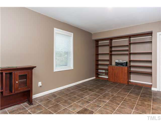 912 Macon Place Raleigh, NC 27609 - Photo 10 of 14 a view of an empty room with a window