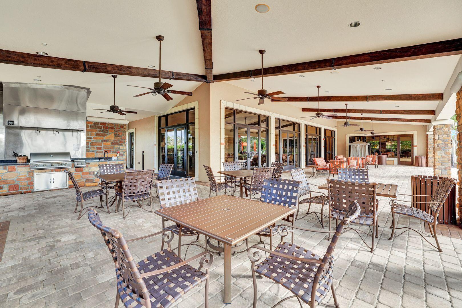 8581 Maggiore Court Naples, FL 34114 - Photo 17 of 33 a view of a dining room with furniture